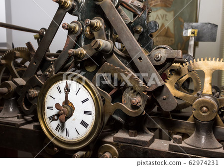 the old clock mechanism, this antique clock is in the commune of Avetrana, Apulia, Italy 62974231