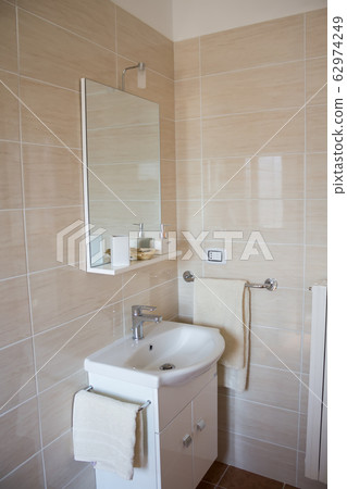 Bathroom interior with sink and faucet Bathroom interior with sink and faucet 62974249