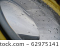 Small raindrops on headlights and body parts. 62975141