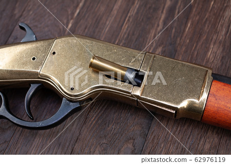 Wild west gun - lever-action repeating rifle with 62976119