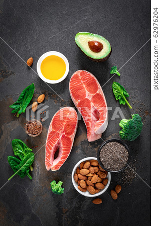 Omega-3 fats. Salmon fish and vegetarian sources 62976204