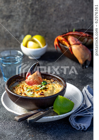 CHILEAN FOOD.  Baked crabmeat crab meat with 62976361