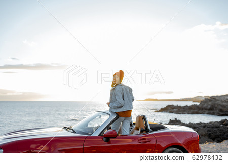 Traveling by car near the ocean 62978432