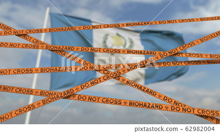 Caution biohazard tape with flag of Guatemala as a background. Guatemalan restricted entry or quarantine. Conceptual 3D rendering Caution biohazard tape with flag of Guatemala as a background. Guatemalan restricted entry or quarantine. Conceptual 3D rendering 62982004