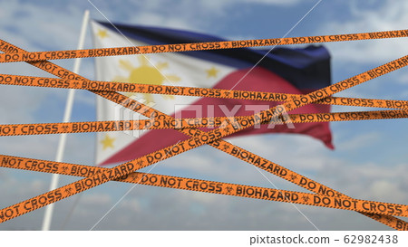 Caution biohazard tape with flag of the Philippines as a background. Restricted entry or quarantine. Conceptual 3D rendering Caution biohazard tape with flag of the Philippines as a background. Restricted entry or quarantine. Conceptual 3D rendering 62982438