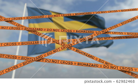Biohazard restriction tape lines against the Swedish flag. Restricted border crossing or quarantine in Sweden. Conceptual 3D rendering Biohazard restriction tape lines against the Swedish flag. Restricted border crossing or quarantine in Sweden. Conceptual 3D rendering 62982468