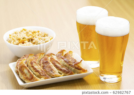 Beer, dumplings and fried rice 62982767
