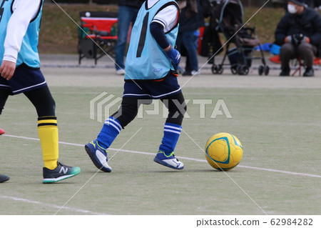 Elementary school boys playing soccer Elementary school boys playing soccer 62984282