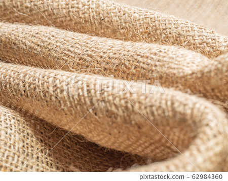 Brown sackcloth. Crumpled burlap textile, close up 62984360