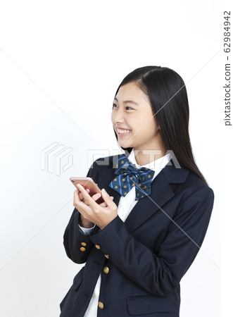 Female student with smartphone 62984942