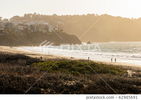 Windy day on Baker Beach near Golden Gate bridge. Windy day on Baker Beach near Golden Gate bridge. 62985691