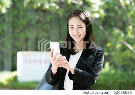 Woman suit smartphone Woman suit smartphone 62986626