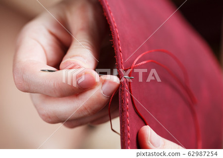 Conceptual profession of a Tanner. The woman's 62987254