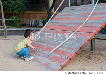 Baby Climbing Barrier at Playground Baby Climbing Barrier at Playground 62991471