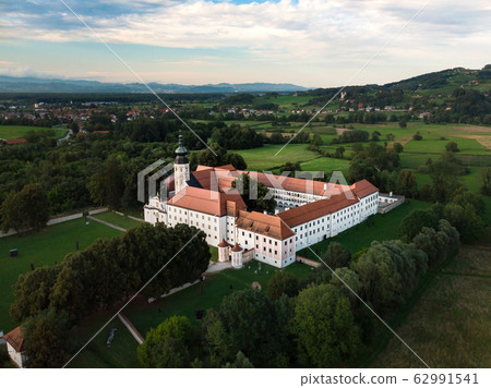 Aerial view of Cistercian monastery Kostanjevica na Krki, homely appointed as Castle Kostanjevica, Slovenia, Europe. 62991541