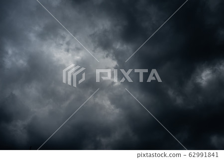 Dark black clouds in the sky, Stormy rain clouds 62991841