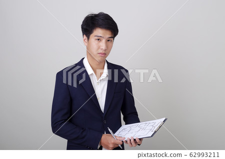Asian businessman architect on white background 62993211