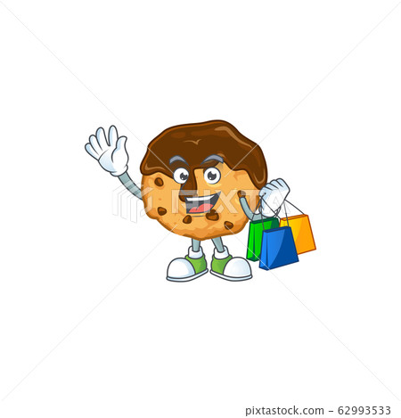 A rich chocolate chips with cream cartoon design waving and holding Shopping bag A rich chocolate chips with cream cartoon design waving and holding Shopping bag 62993533