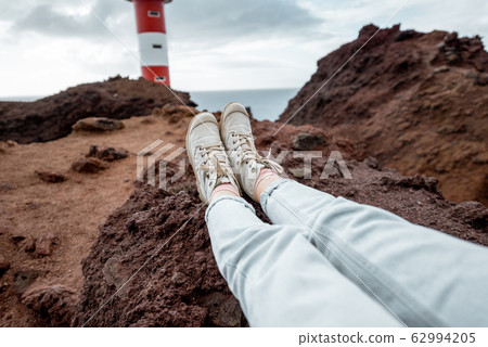 Traveler on the rocky landscapes 62994205