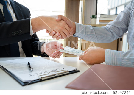 Bribery and corruption, Businessman hand giving 62997245