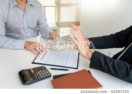 Businessman rejecting money or refusing money form Businessman rejecting money or refusing money form 62997250