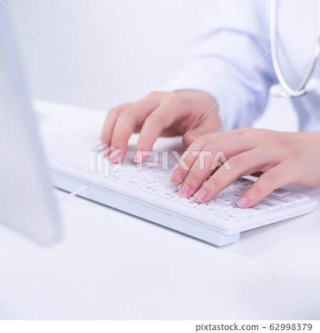 Doctor female working office typing stethoscope Doctor female working 62998379