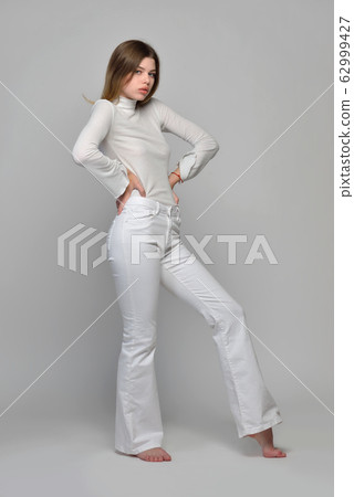 sexy beautiful woman in white clothes posing in sexy beautiful woman in white clothes posing in 62999427