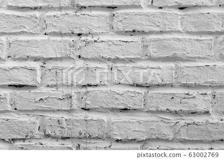 Dirty white brick wall pattern background 63002769