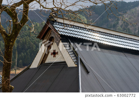 Crest of an old private house in the countryside 63002772