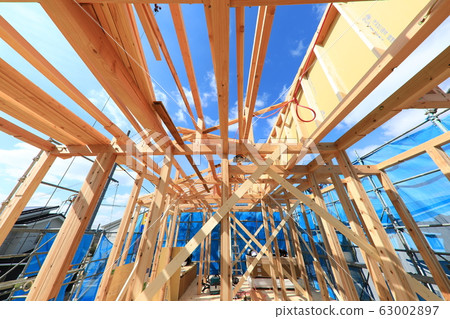 New building detached house upper building site on a sunny day New building detached house upper building site on a sunny day 63002897