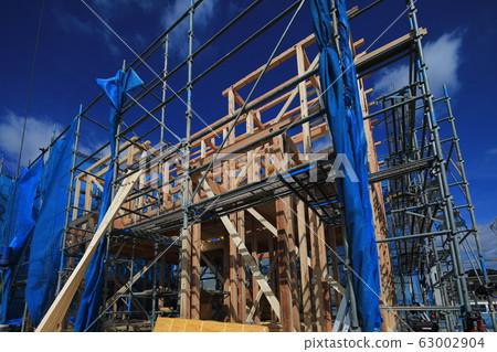 New building detached house upper building site on a sunny day 63002904
