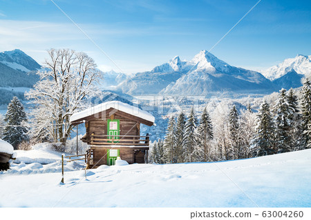 Rustic mountain cabin in the Alps in winter Rustic mountain cabin in the Alps in winter 63004260