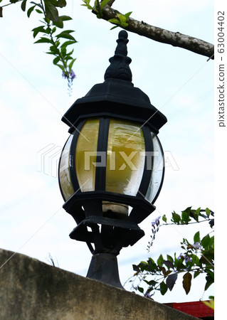 Close up shot of an old lamp on the wall 63004402