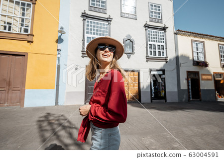 Woman traveling in the old town La Laguna on Tenerife island 63004591