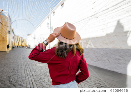 Woman traveling in the old spanish town on Tenerife island Woman traveling in the old spanish town on Tenerife island 63004656