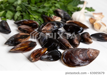 Cook ingredients - fresh raw mussels with parsley Cook ingredients - fresh raw mussels with parsley 63005679