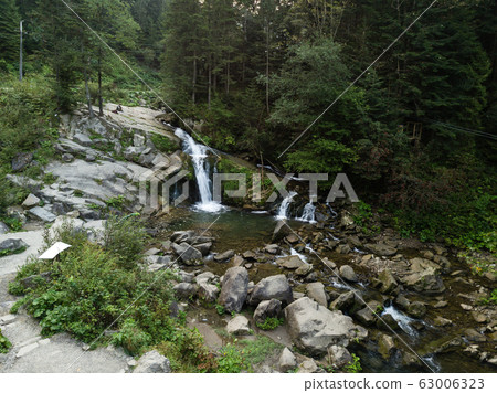 Waterfall Kameneckiy in the Carpathian mountains Waterfall Kameneckiy in the Carpathian mountains 63006323