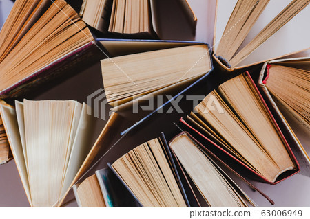 Old and used hardcover books or textbooks visible Old and used hardcover books or textbooks visible 63006949