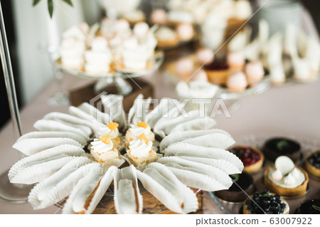 Buffet with a variety of delicious sweets, food ideas, celebration 63007922