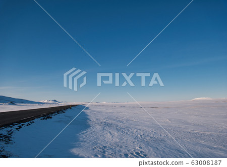 Road in the snowy landscape of Iceland Road in the snowy landscape of Iceland 63008187
