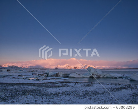 View of a glacier lagoon at sunrise 63008299