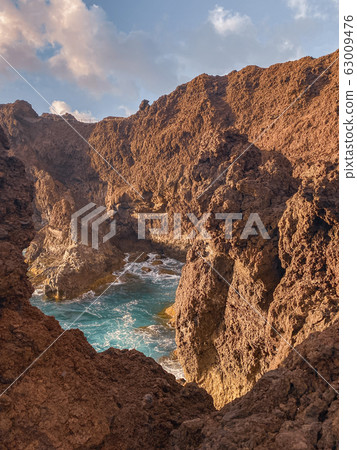 Steep precipice on rocky coast Steep precipice on rocky coast 63009476