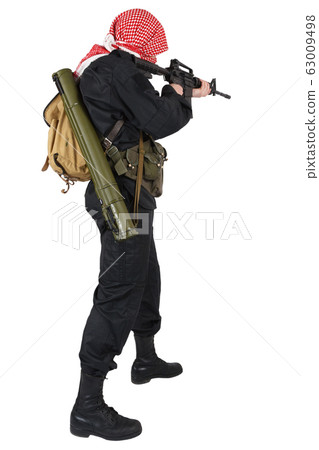 guerillas in black uniform with keffiyeh with guerillas in black uniform with keffiyeh with 63009498