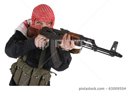guerillas in black uniform with keffiyeh with AK 63009504