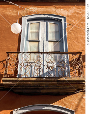 Architectural fragment of the old building in colonial style Architectural fragment of the old building in colonial style 63009876