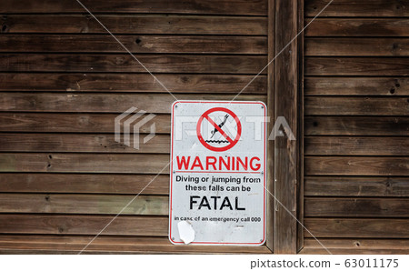 Warning Sign Not To Dive From Waterfall 63011175