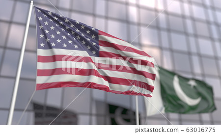 Waving flags of the USA and Pakistan near modern skyscraper. 3D rendering Waving flags of the USA and Pakistan near modern skyscraper. 3D rendering 63016775