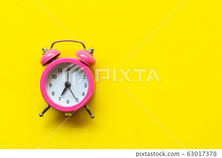 Alarm green vintage alarm clock falling 63017378