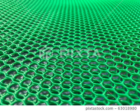 Background mesh hole plastic fiber that is green Background mesh hole plastic fiber that is green 63018980