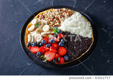 Asian traditional pancake martabak manis with mint 63022757